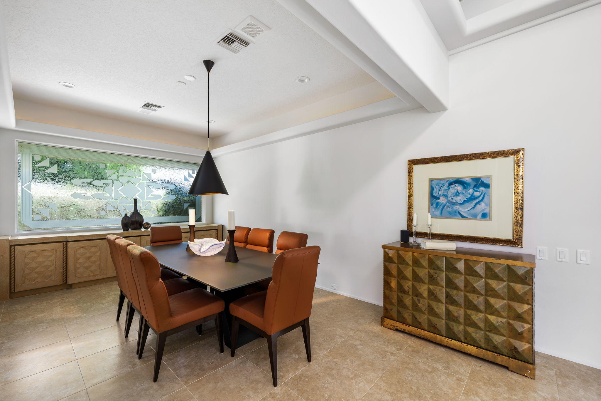 74 Mayfair Drive Rancho Mirage, CA 92270 - Photo 14 of 35 a dining room with furniture and window
