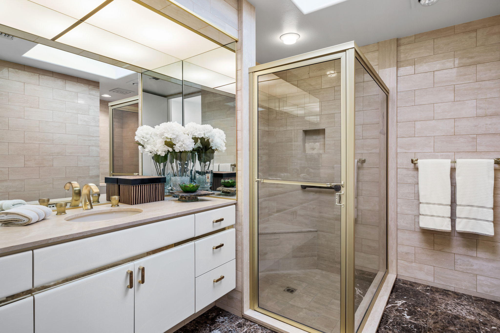 74 Mayfair Drive Rancho Mirage, CA 92270 - Photo 18 of 35 a bathroom with a shower sink and mirror