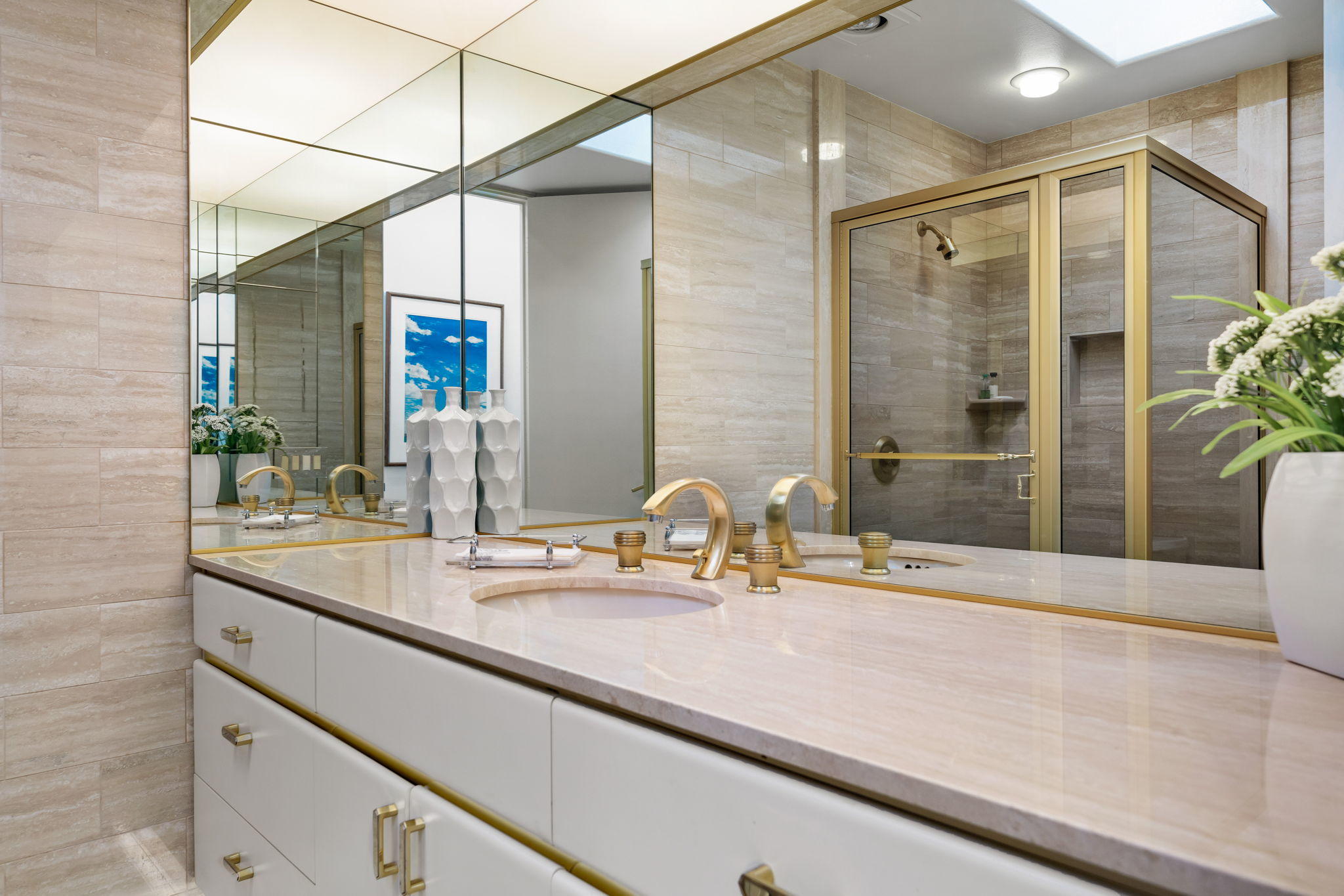 74 Mayfair Drive Rancho Mirage, CA 92270 - Photo 22 of 35 a bathroom with a sink and a mirror