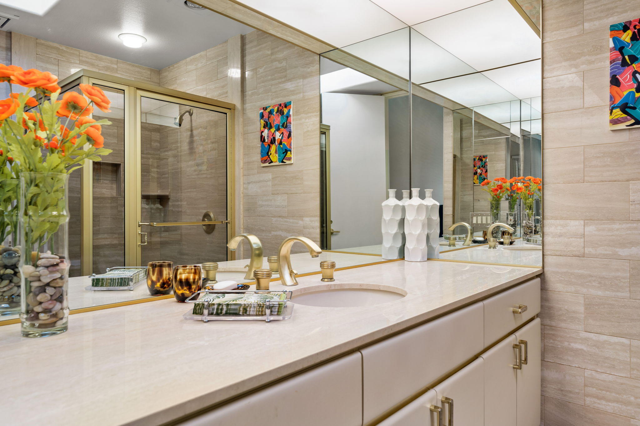 74 Mayfair Drive Rancho Mirage, CA 92270 - Photo 25 of 35 a bathroom with a sink and a mirror
