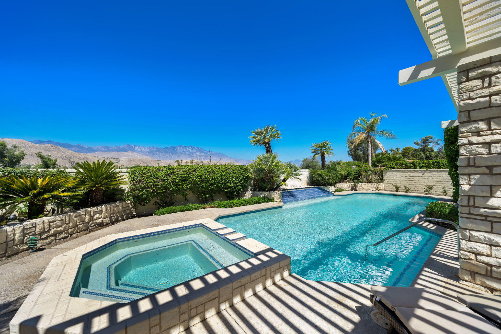 74 Mayfair Drive Rancho Mirage, CA 92270 - Photo 31 of 35 a view of a backyard with sitting area