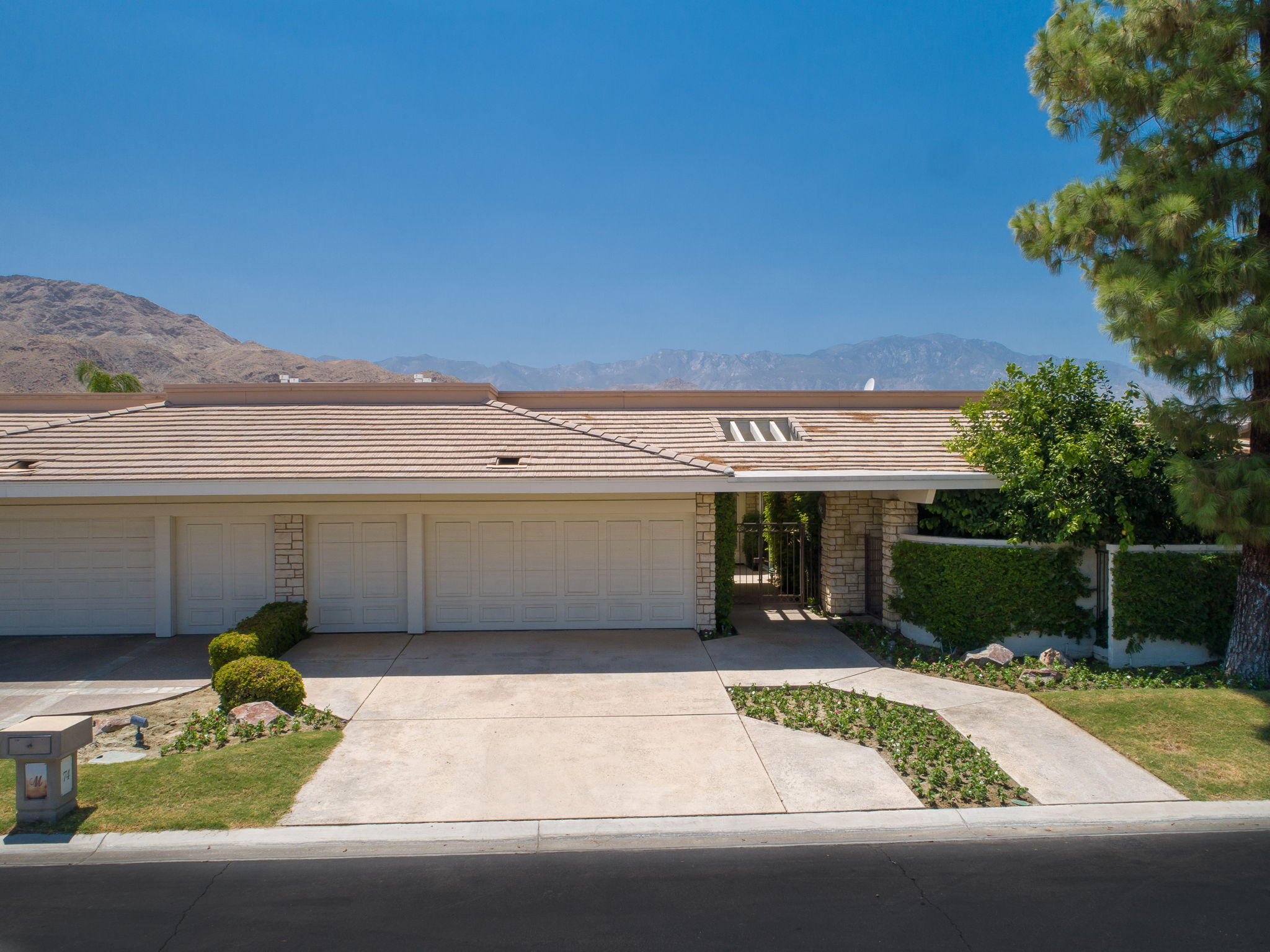 74 Mayfair Drive Rancho Mirage, CA 92270 - Photo 33 of 35 a house view with a outdoor space