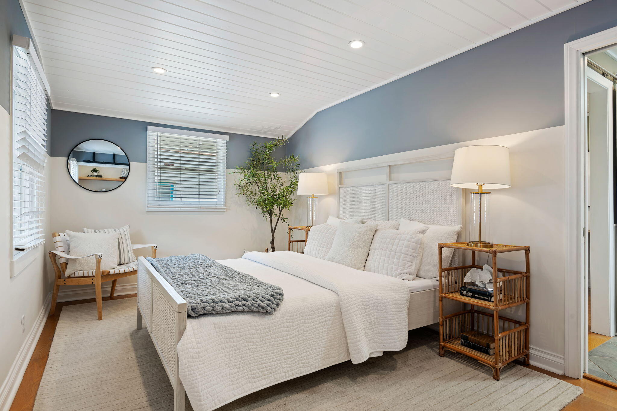 2129 Red Rose Way Santa Barbara, CA 93109 - Photo 27 of 44 a bedroom with a bed and a lamp