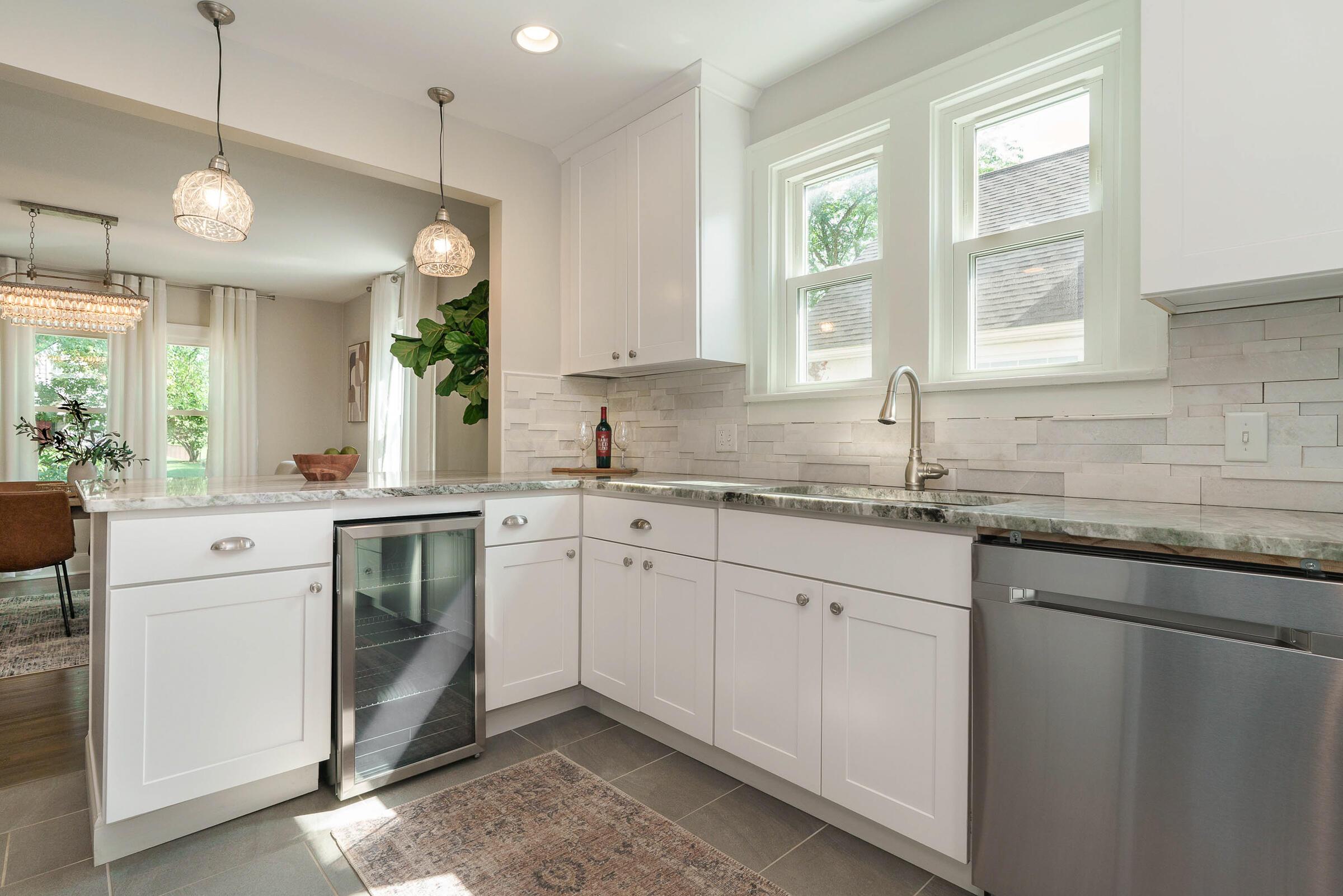 163 Garden Road Columbus, OH 43214 - Photo 17 of 46 From the beverage fridge to the elegant lighting, every detail has been meticulously curated to create a timeless and comfortable modern home.