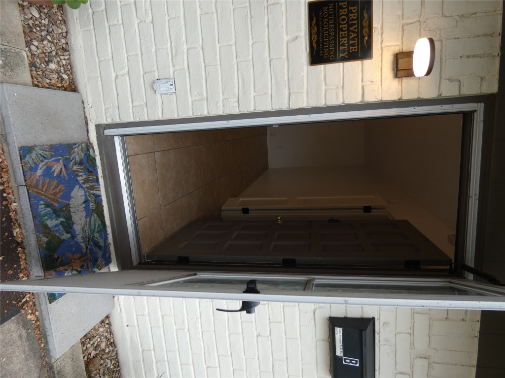 2203 Western Trails Boulevard, Unit B Austin, TX 78745 - Photo 2 of 33 a bathroom with a shower