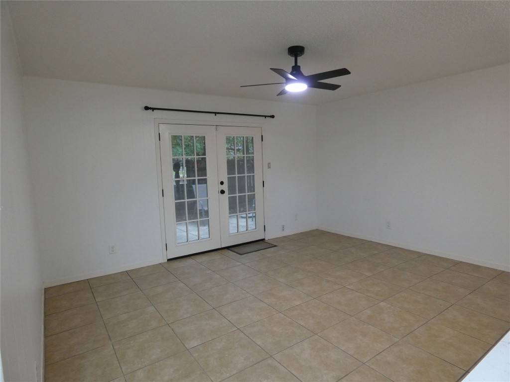2203 Western Trails Boulevard, Unit B Austin, TX 78745 - Photo 8 of 33 a view of an empty room with a window