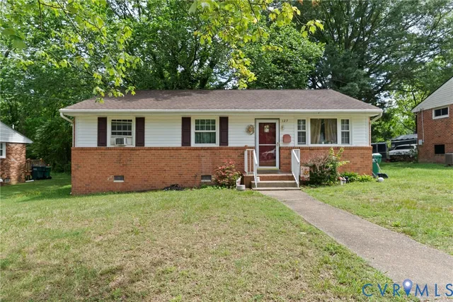 front view of a house with a yard