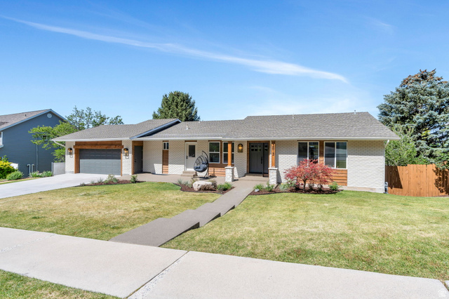 3813 North Foothill Drive Provo, UT 84604 - Photo 2 of 71 Contemporary ranch-style residence featuring a light brick facade and dark wood accents