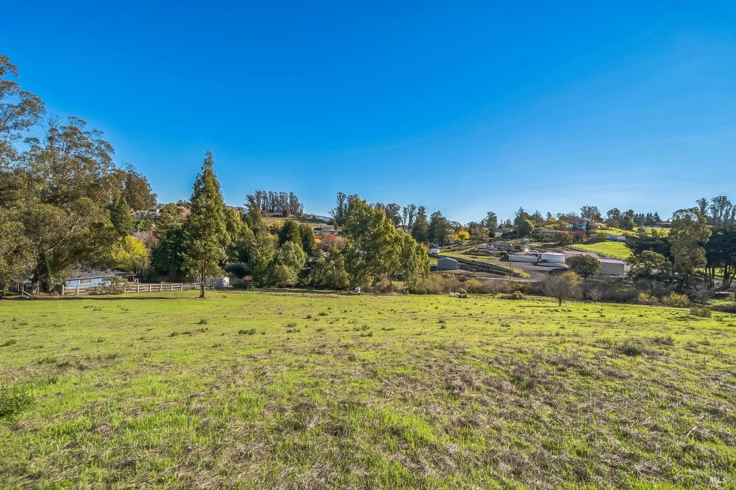 9053 Water Road Cotati, CA 94931 - Photo 13 of 20 a view of a field with an ocean