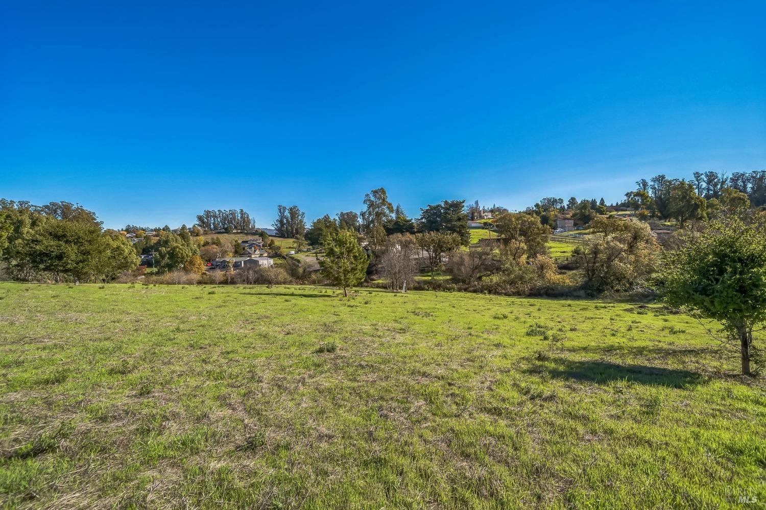 9053 Water Road Cotati, CA 94931 - Photo 16 of 20 a view of a field with an ocean