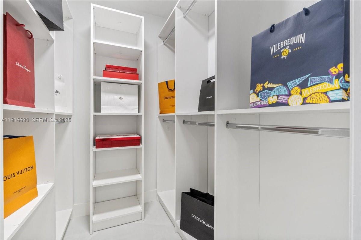 7129 Promenade Drive, Unit 801 Boca Raton, FL 33433 - Photo 20 of 42 a utility room with dryer and washer