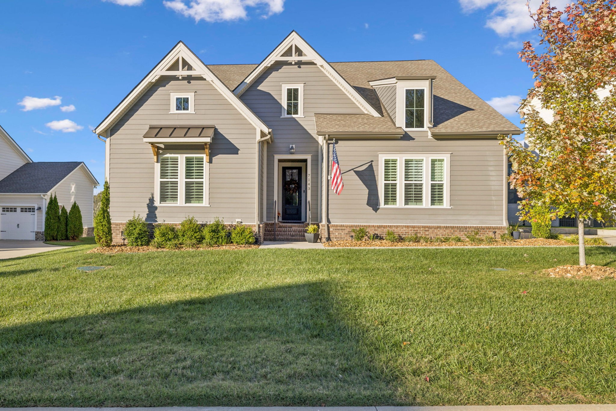 7143 Neills Branch Drive College Grove, TN 37046 - Photo 2 of 74 a front view of a house with a yard