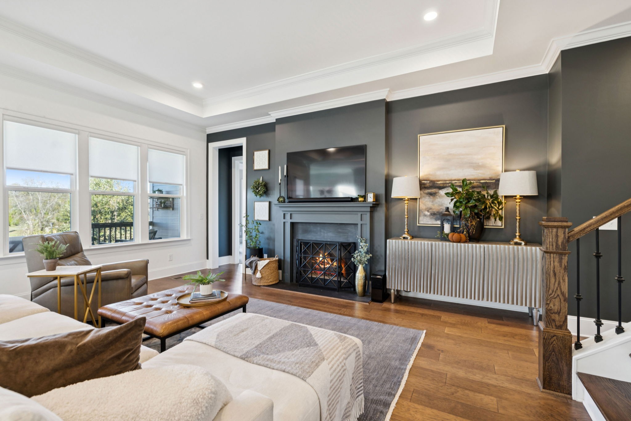 7143 Neills Branch Drive College Grove, TN 37046 - Photo 23 of 74 a living room with furniture and a fireplace