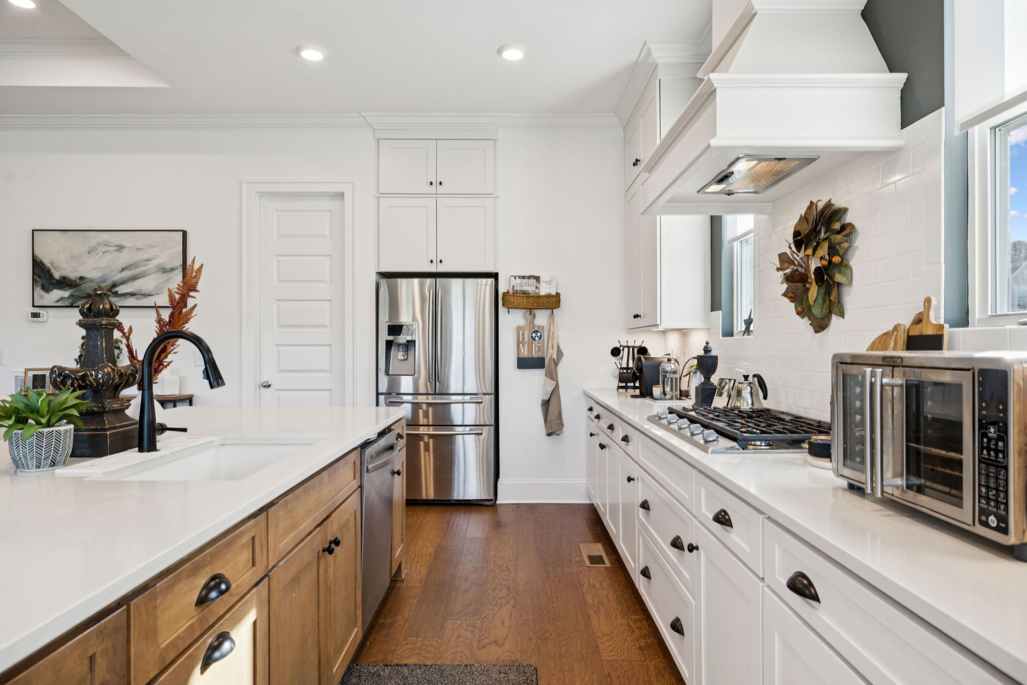 7143 Neills Branch Drive College Grove, TN 37046 - Photo 33 of 74 a kitchen with stainless steel appliances a sink and a refrigerator