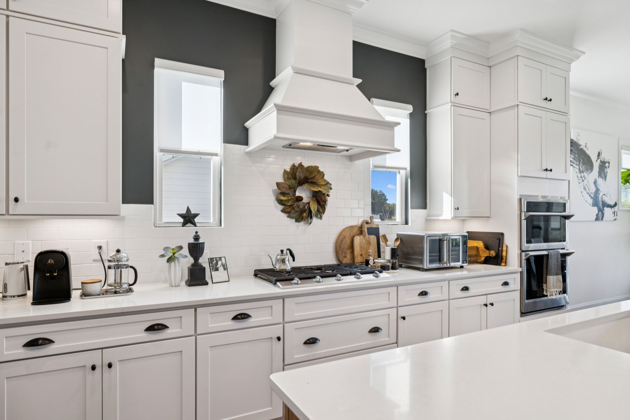 7143 Neills Branch Drive College Grove, TN 37046 - Photo 36 of 74 a kitchen with stainless steel appliances a sink and cabinets