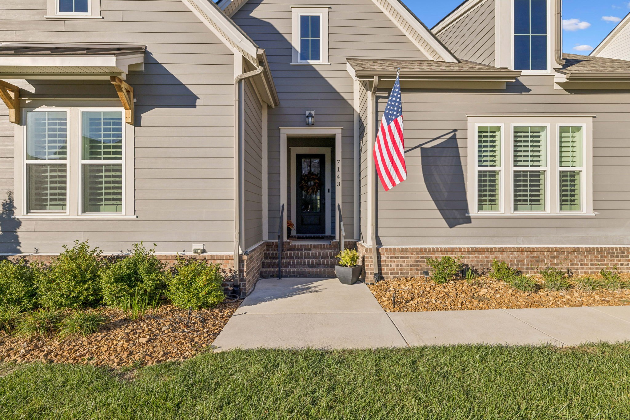 7143 Neills Branch Drive College Grove, TN 37046 - Photo 6 of 74 a front view of a house with a yard