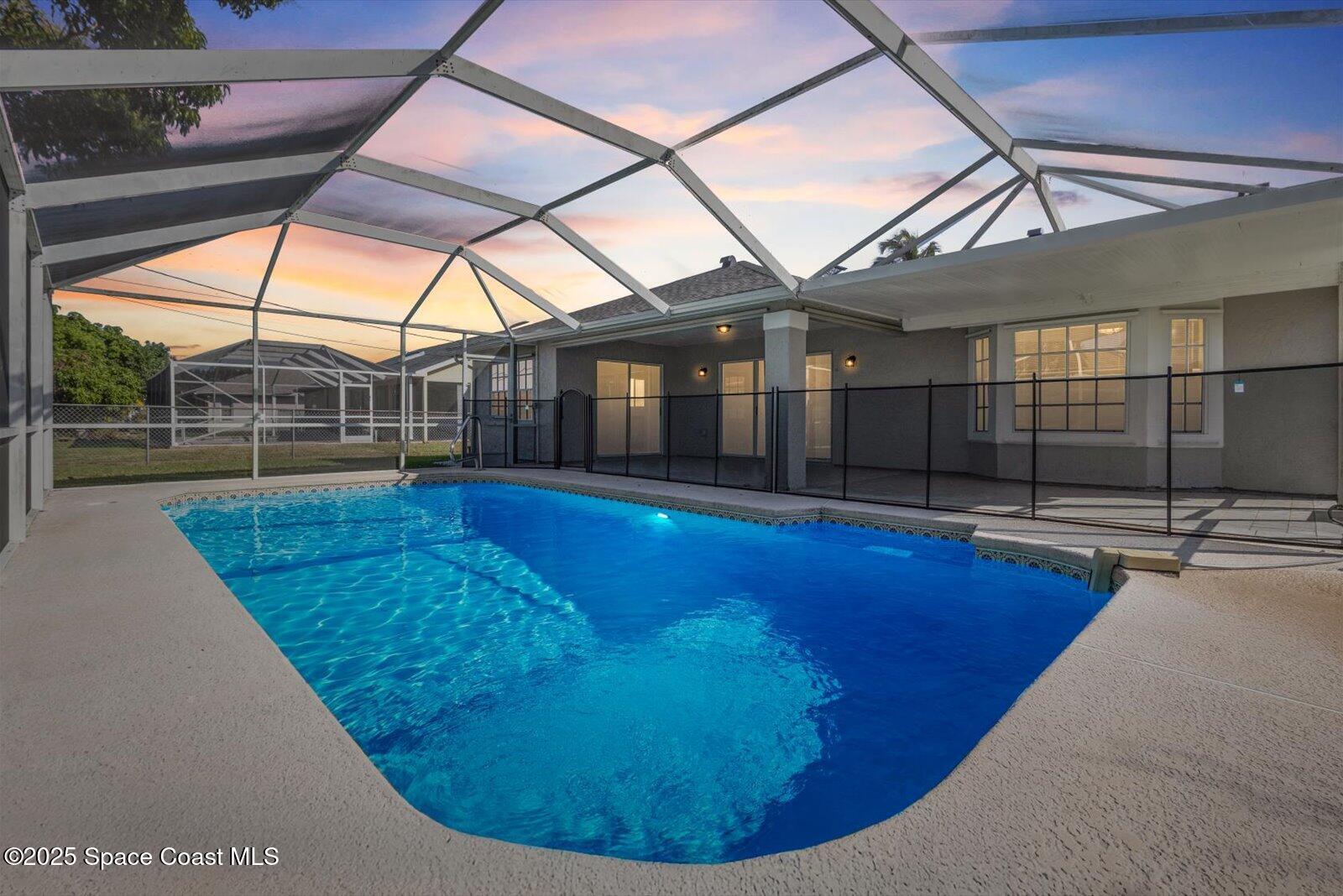 1037 Southwest California Boulevard Port St. Lucie, FL 34953 - Photo 3 of 38 a view of a indoor swimming pool