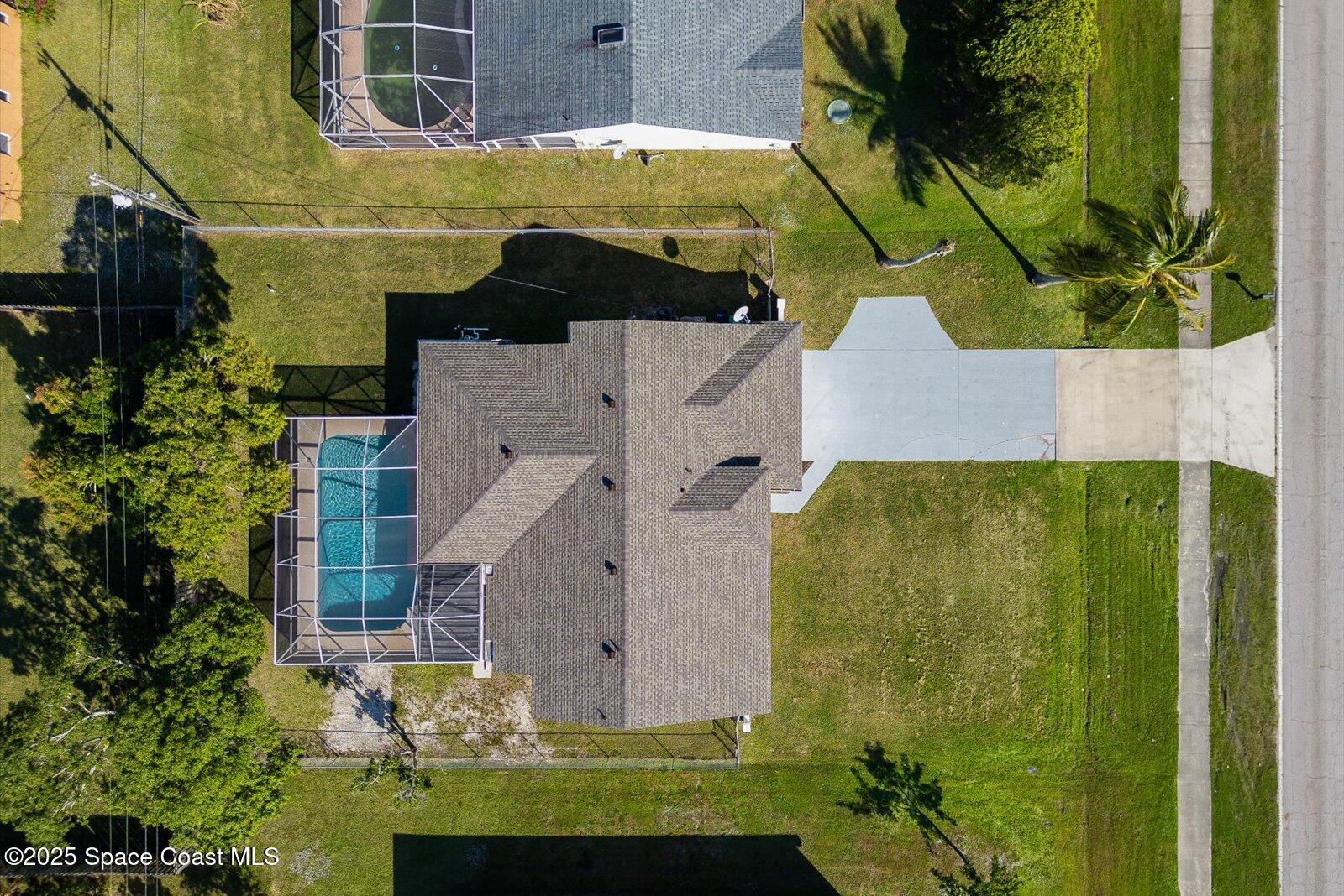 1037 Southwest California Boulevard Port St. Lucie, FL 34953 - Photo 35 of 38 an aerial view of a house