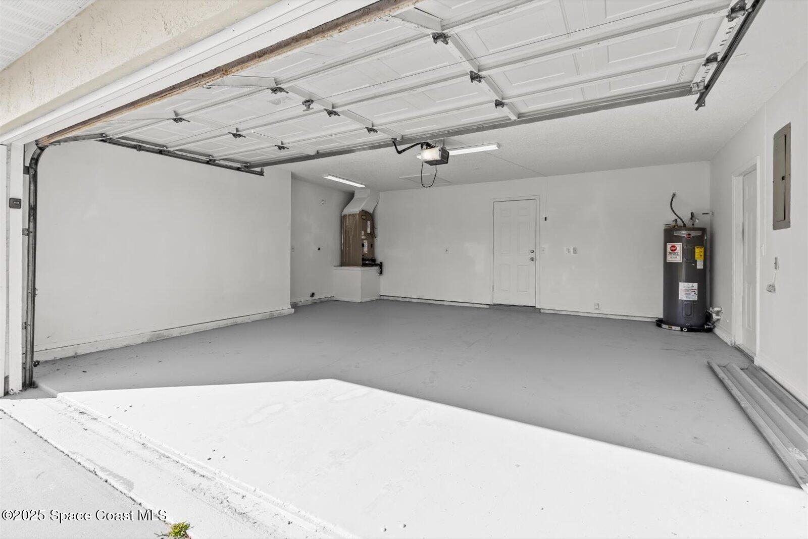 1037 Southwest California Boulevard Port St. Lucie, FL 34953 - Photo 37 of 38 a view of a garage