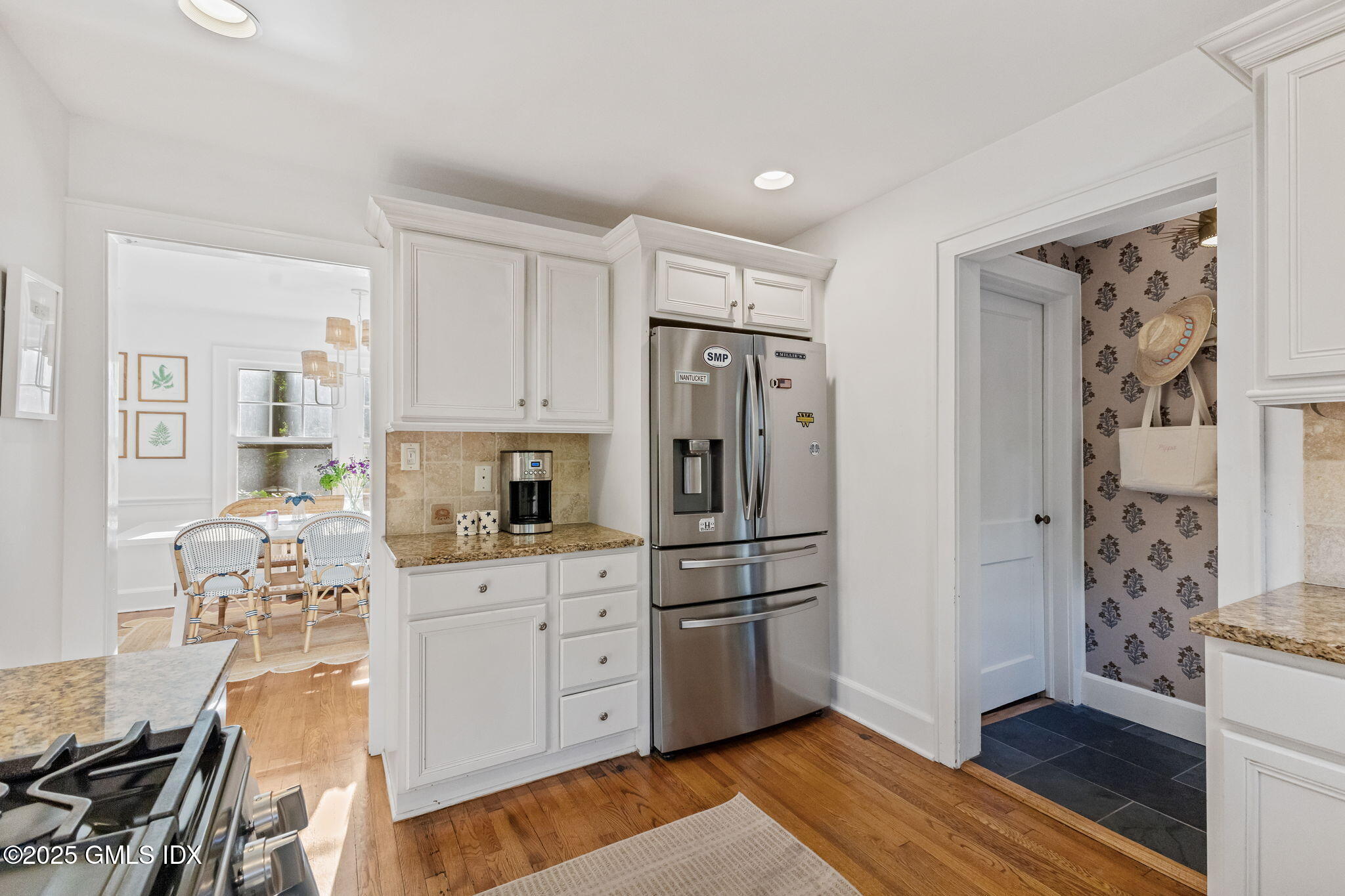 27 Briar Brae Road Stamford, CT 06903 - Photo 13 of 28 a kitchen with stainless steel appliances a refrigerator sink and cabinets