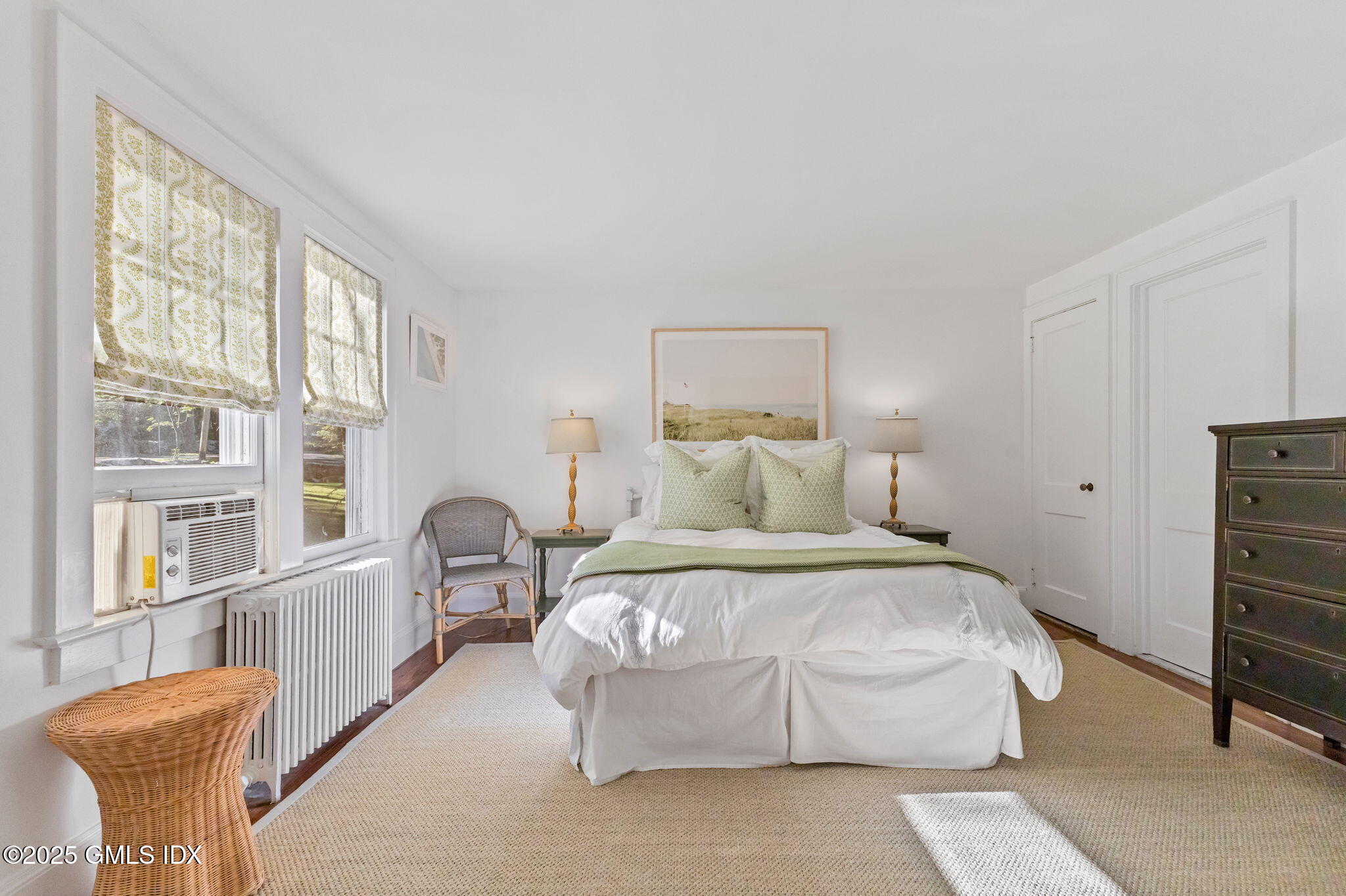 27 Briar Brae Road Stamford, CT 06903 - Photo 14 of 28 a bedroom with a bed and a large window