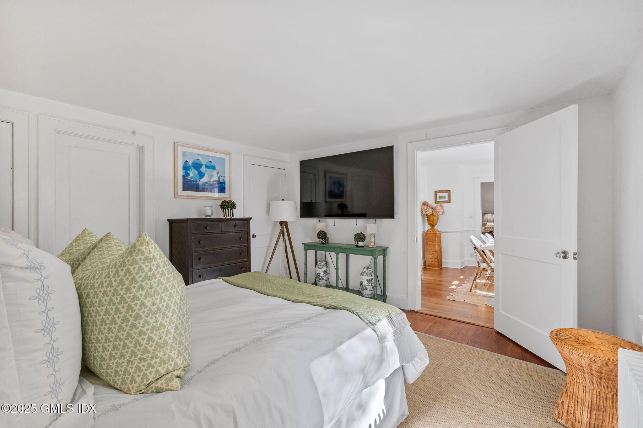 27 Briar Brae Road Stamford, CT 06903 - Photo 15 of 28 a bedroom with a bed and a flat screen tv