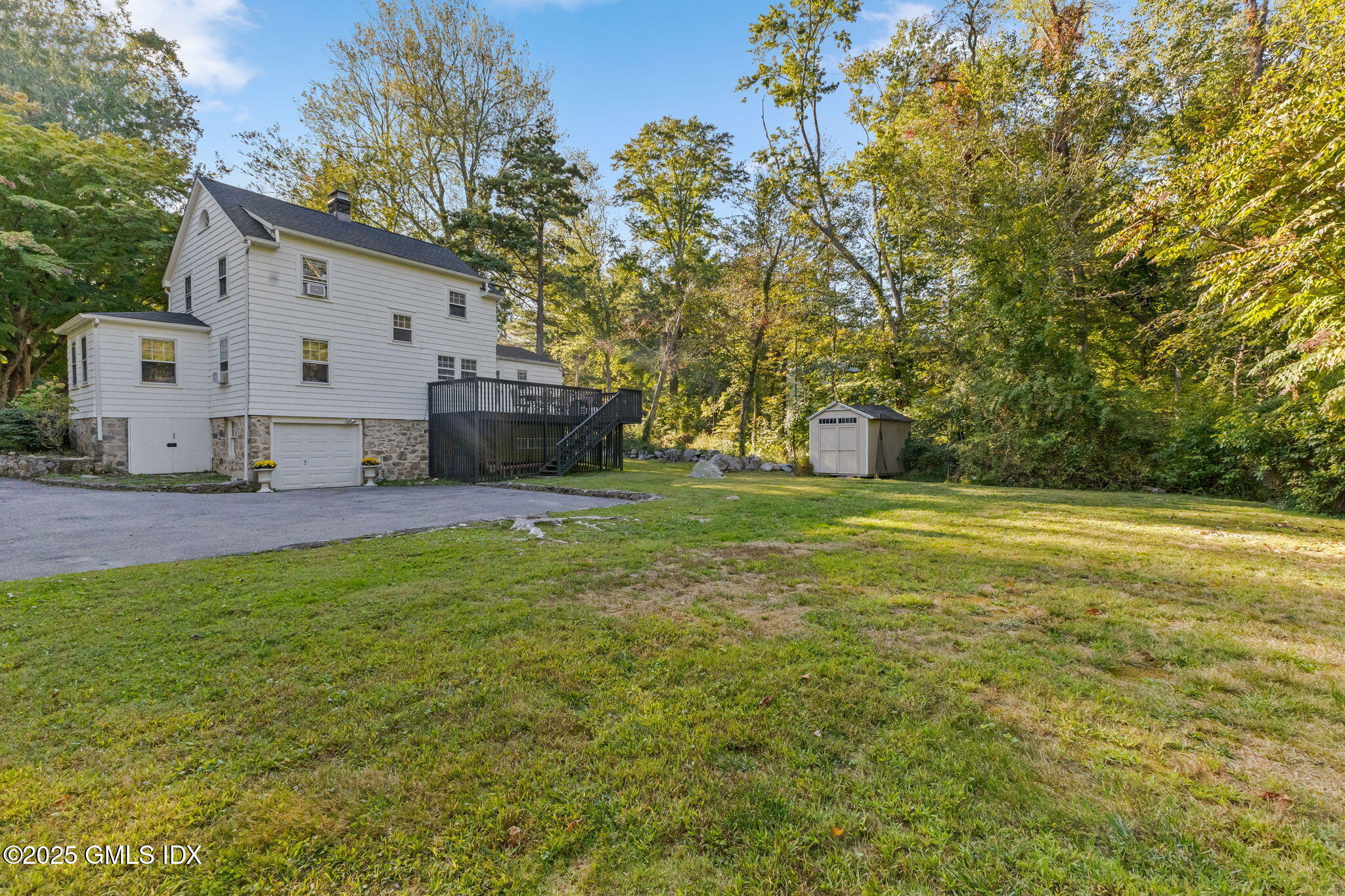 27 Briar Brae Road Stamford, CT 06903 - Photo 22 of 28 a view of a house with a yard