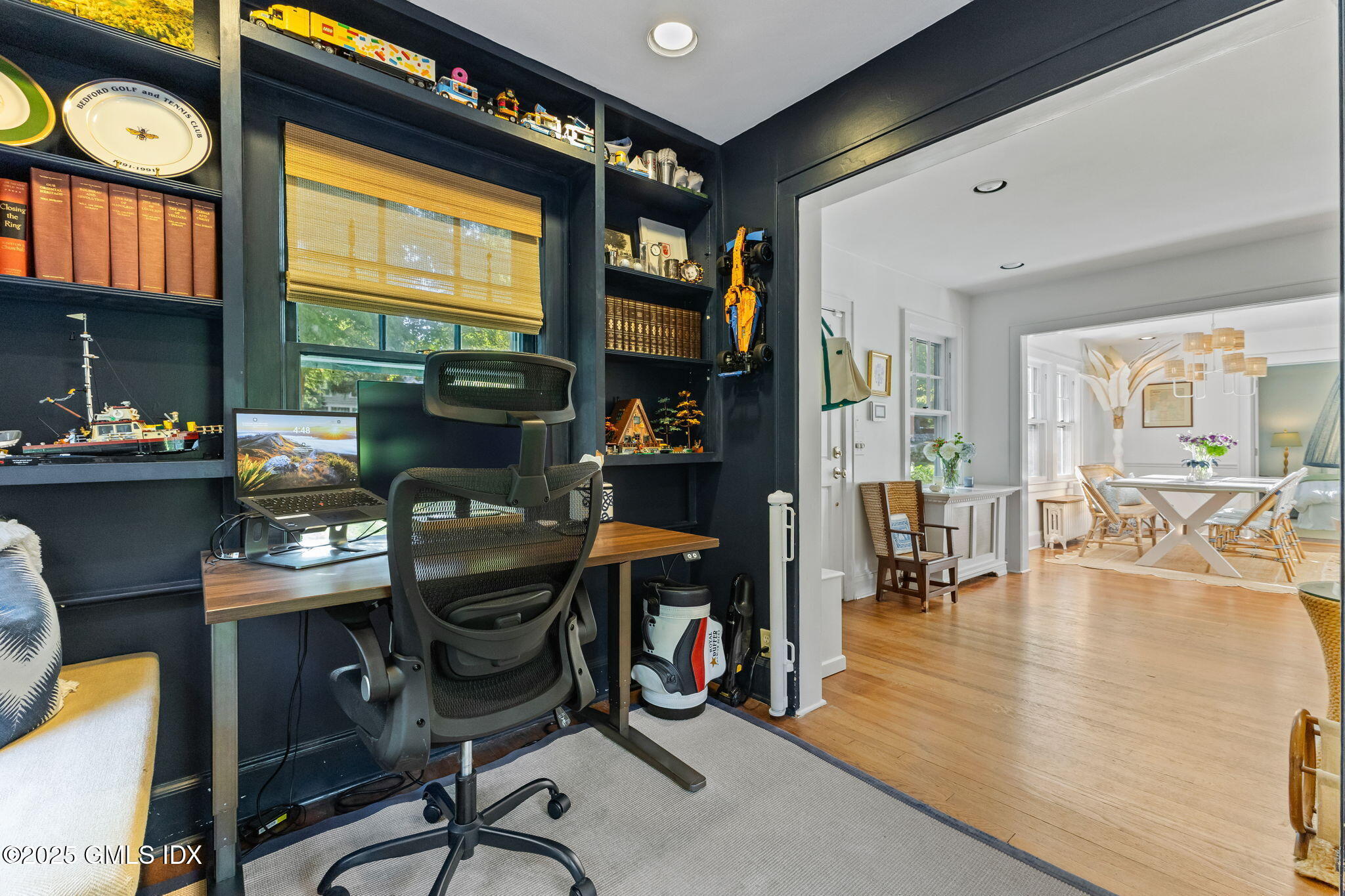 27 Briar Brae Road Stamford, CT 06903 - Photo 7 of 28 a work place with a large window and glass table