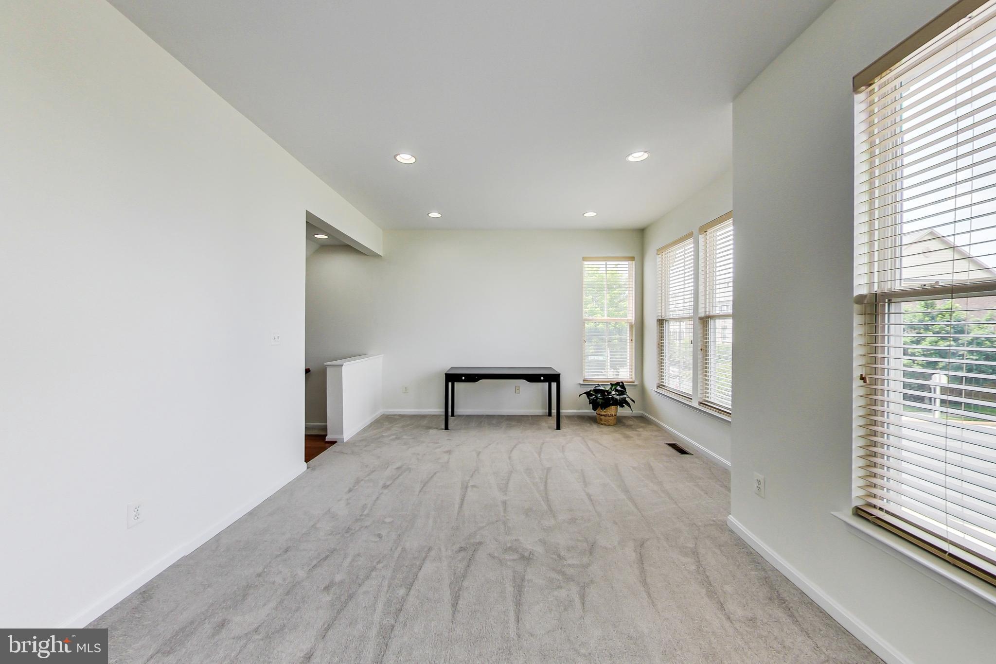 9139 Ribbon Falls Loop Bristow, VA 20136 - Photo 11 of 49 Mid level living and dining