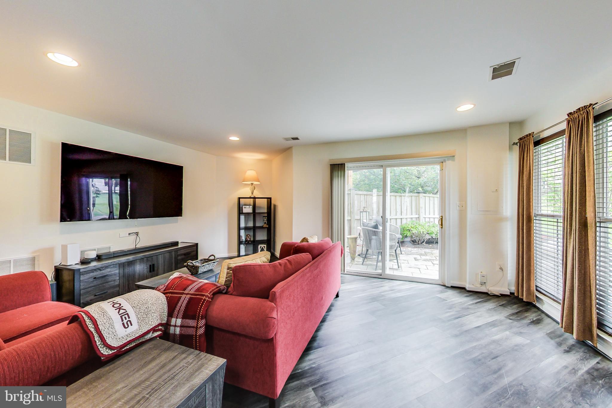 9139 Ribbon Falls Loop Bristow, VA 20136 - Photo 6 of 49 Lower level entertainment space