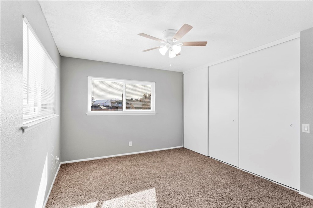 15846 Inyo Street Victorville, CA 92395 - Photo 16 of 44 a view of an empty room with a window