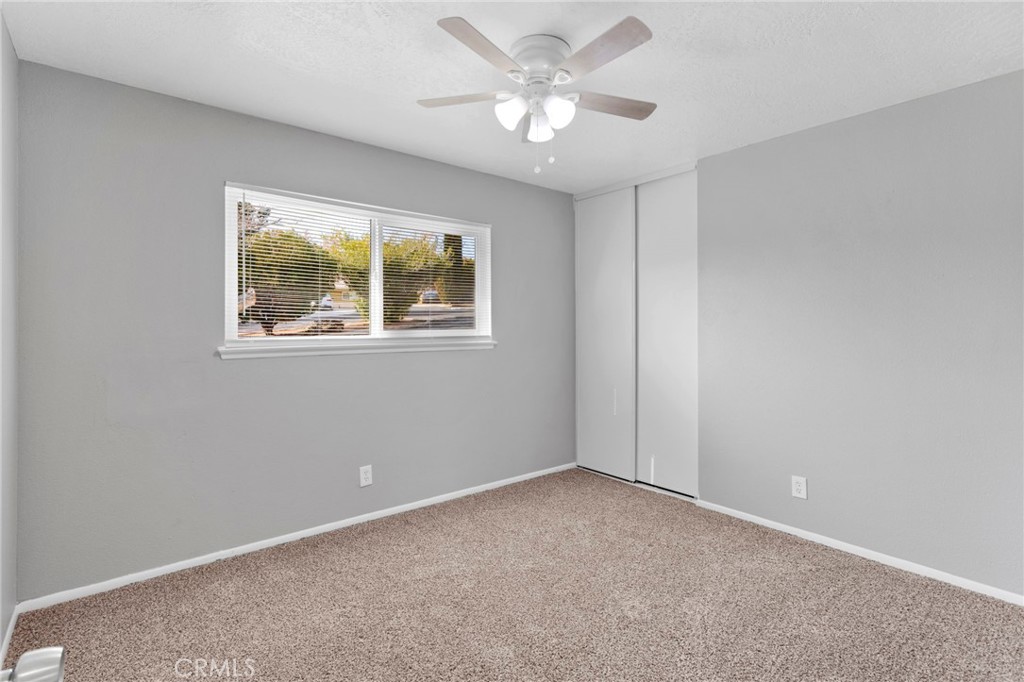 15846 Inyo Street Victorville, CA 92395 - Photo 17 of 44 a view of an empty room with a window