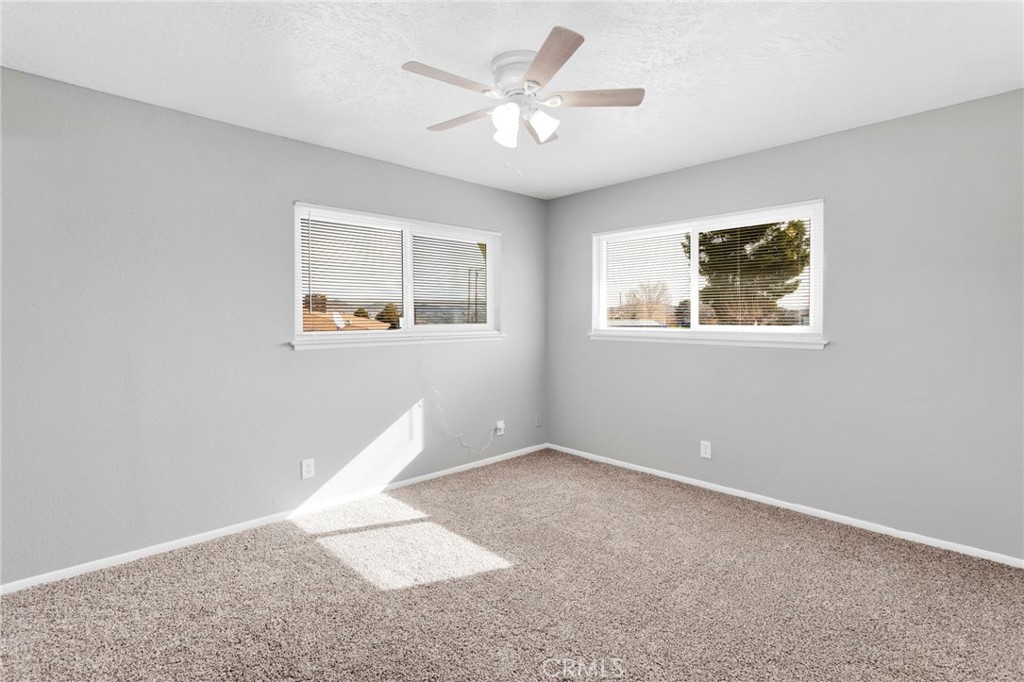 15846 Inyo Street Victorville, CA 92395 - Photo 19 of 44 a view of an empty room with a window