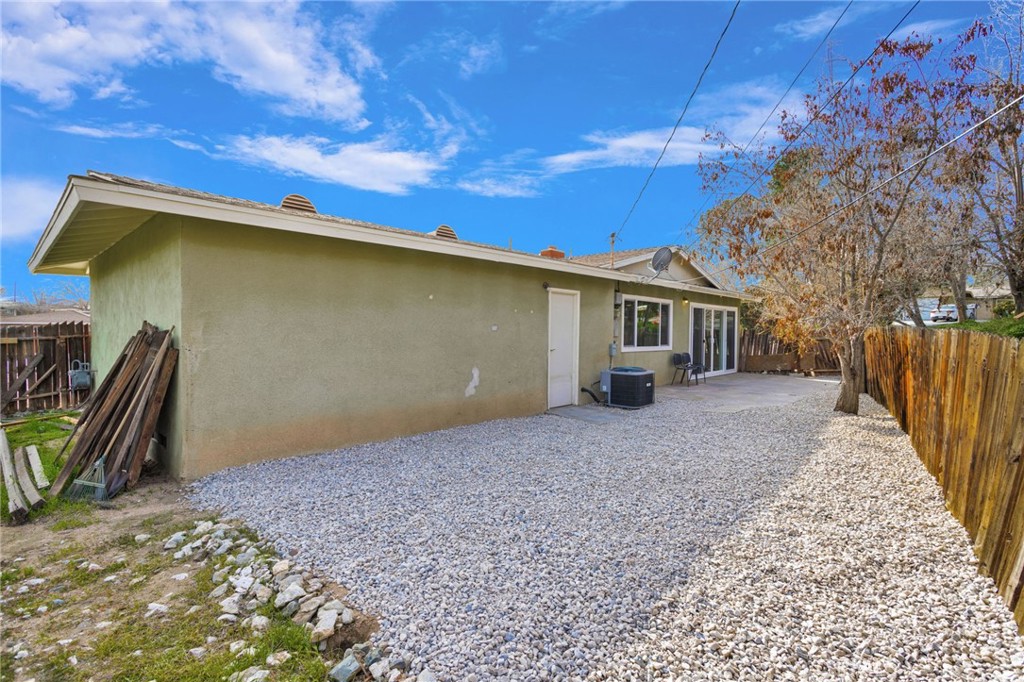 15846 Inyo Street Victorville, CA 92395 - Photo 28 of 44 a front view of a house with a yard