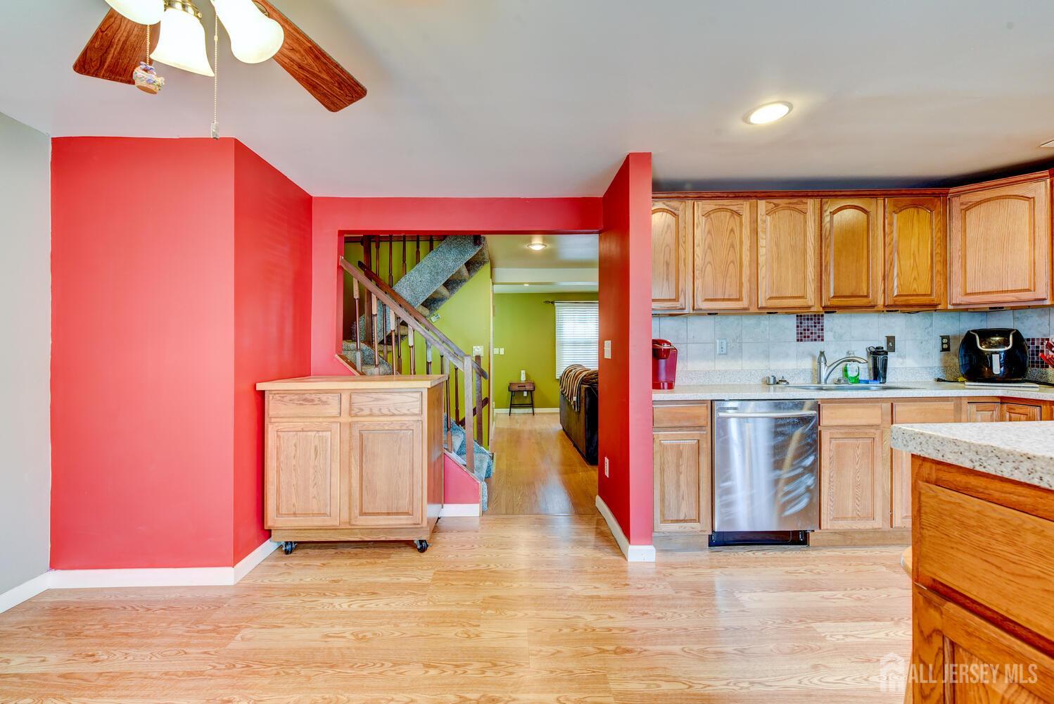 675 Bound Brook Road, Unit C0016 Dunellen, NJ 08812 - Photo 18 of 39 a view of a kitchen with a sink and a window