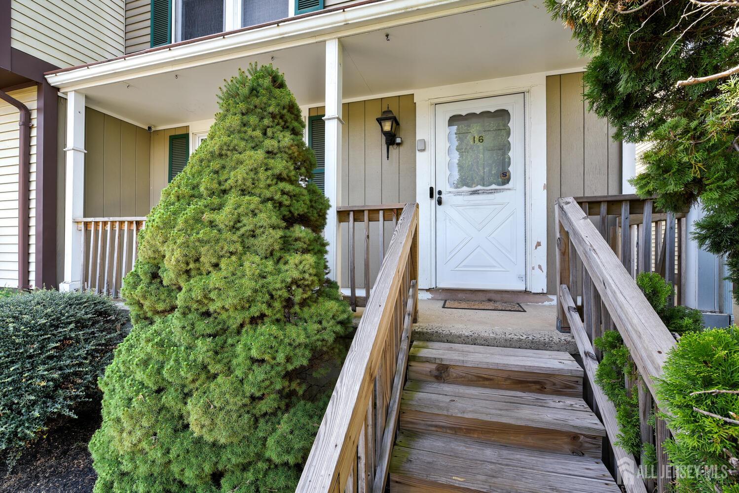 675 Bound Brook Road, Unit C0016 Dunellen, NJ 08812 - Photo 3 of 39 a view of a entryway front of house