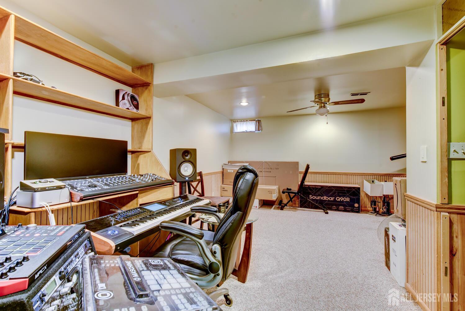 675 Bound Brook Road, Unit C0016 Dunellen, NJ 08812 - Photo 33 of 39 a bedroom with furniture and a flat screen tv