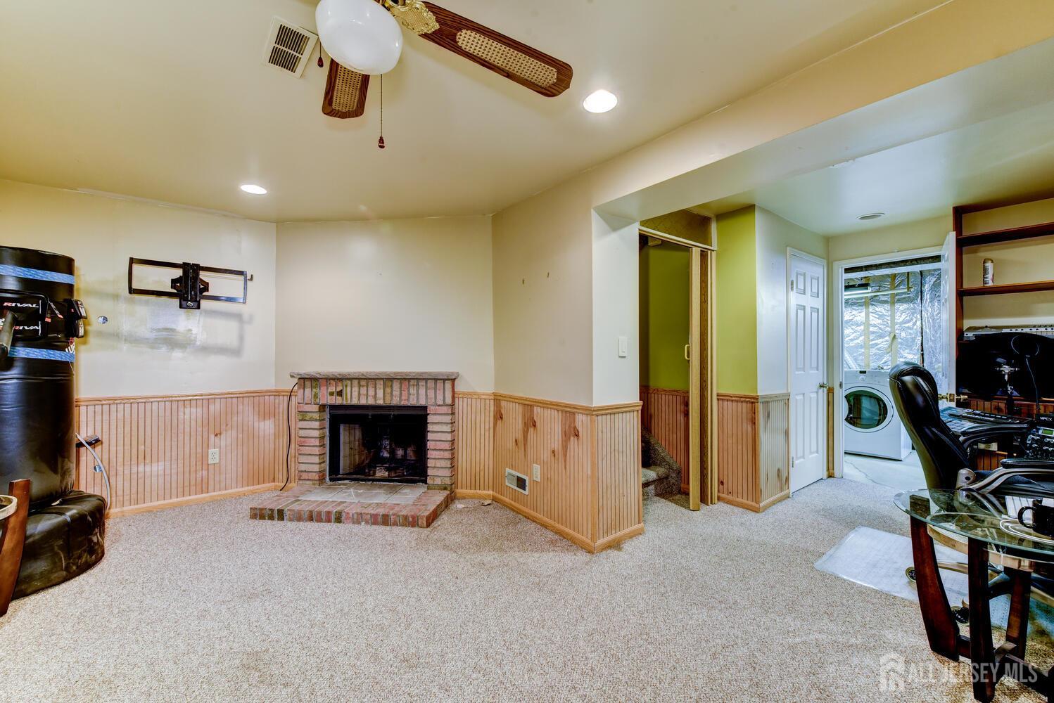 675 Bound Brook Road, Unit C0016 Dunellen, NJ 08812 - Photo 34 of 39 a view of livingroom with furniture and a fireplace