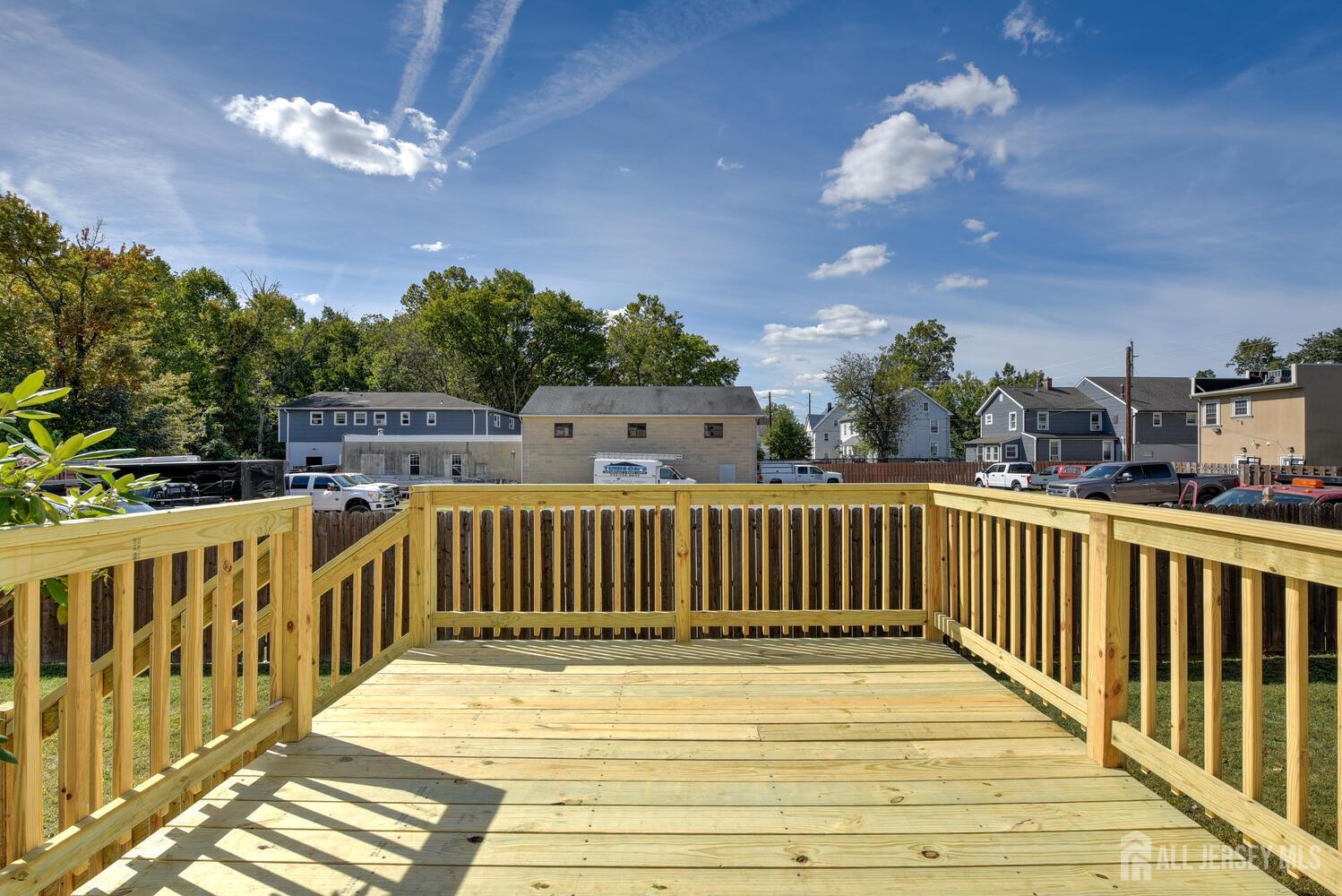 675 Bound Brook Road, Unit C0016 Dunellen, NJ 08812 - Photo 36 of 39 a view of a balcony with wooden floor