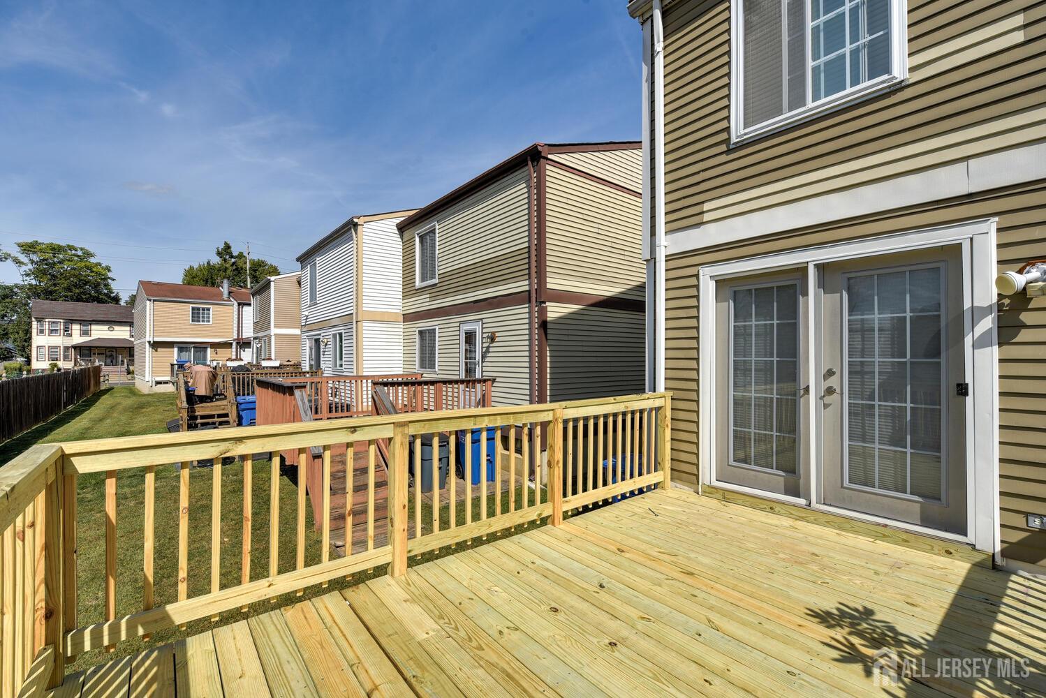 675 Bound Brook Road, Unit C0016 Dunellen, NJ 08812 - Photo 38 of 39 a view of a house with a balcony