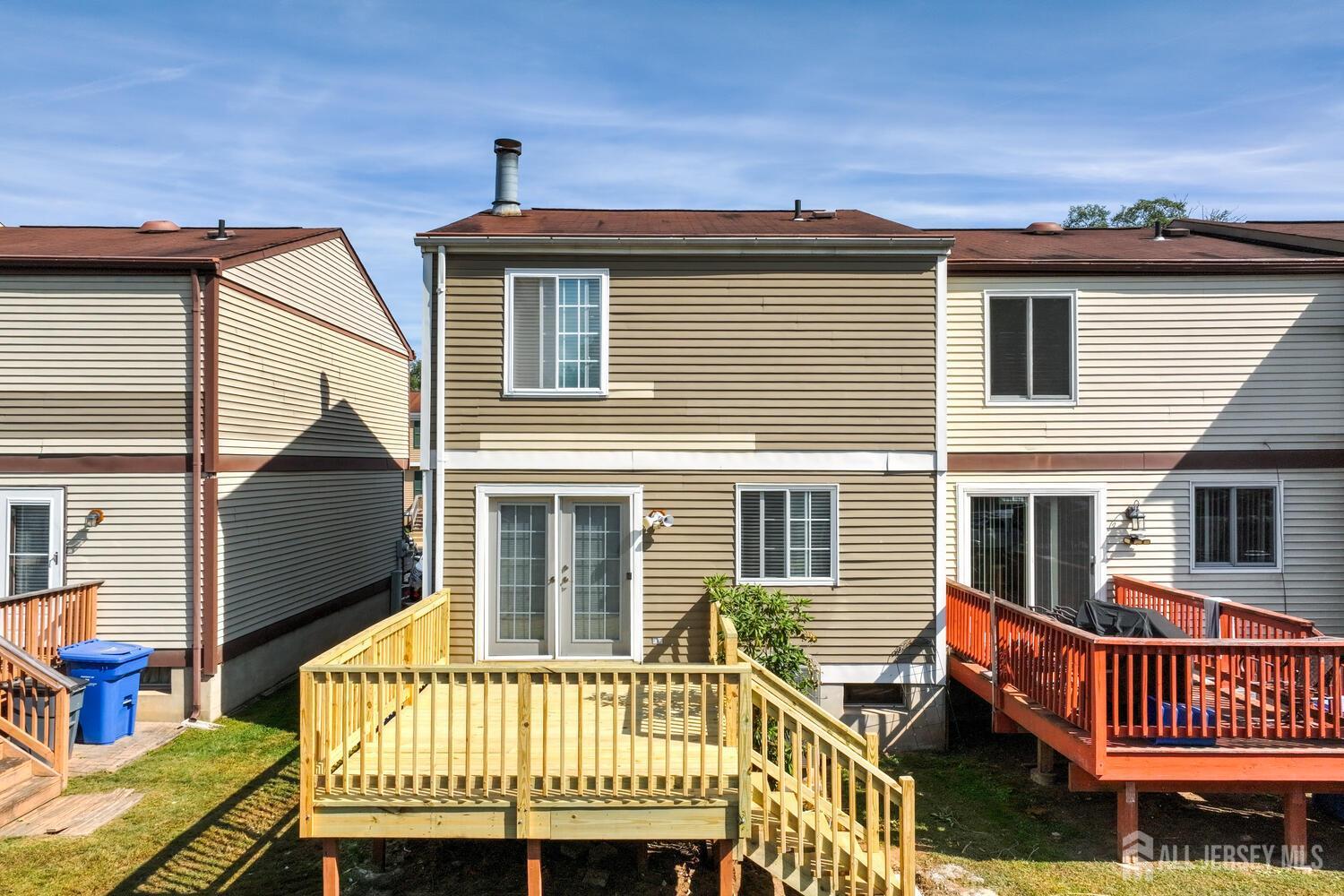 675 Bound Brook Road, Unit C0016 Dunellen, NJ 08812 - Photo 39 of 39 a view of a house with a wooden fence