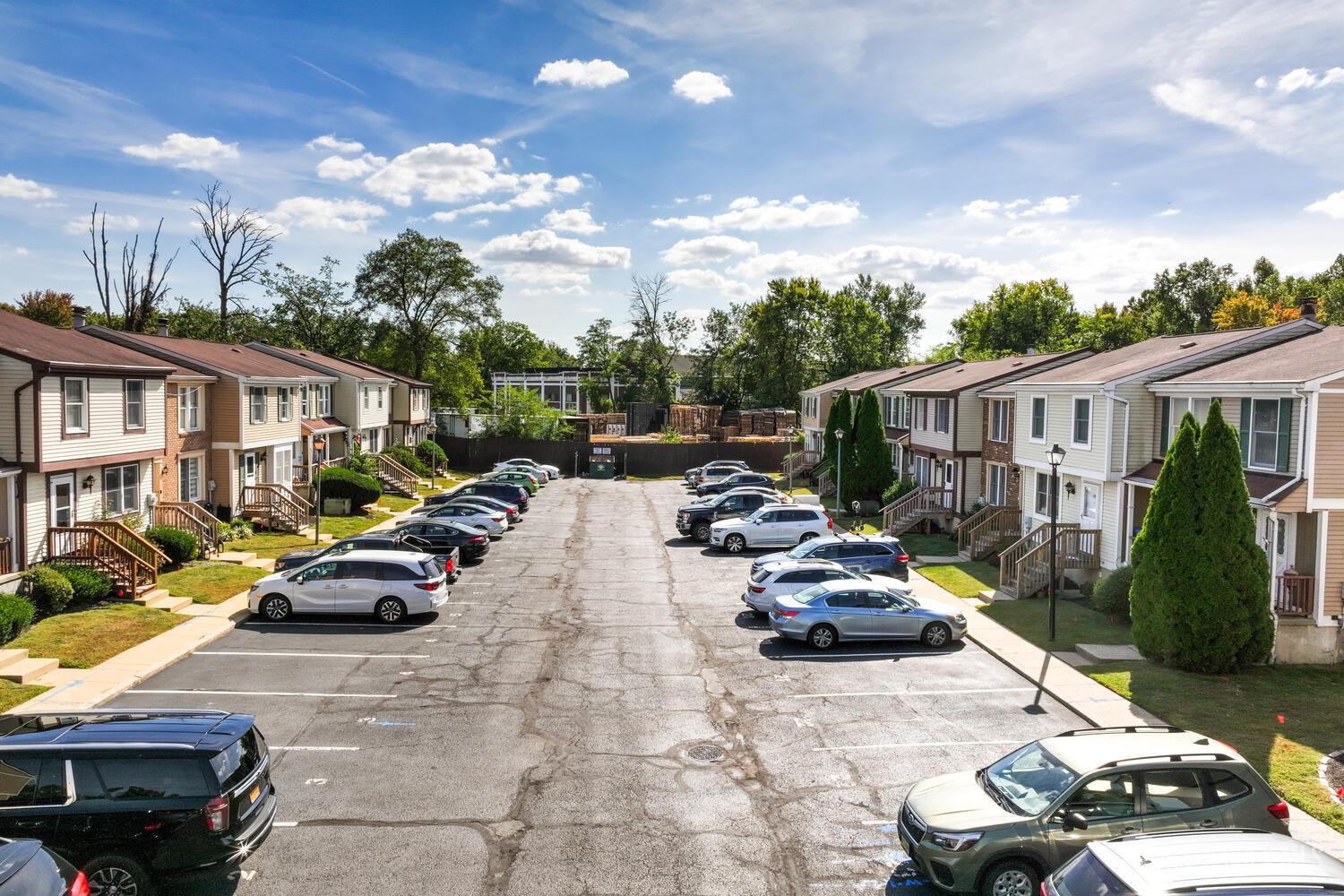 675 Bound Brook Road, Unit C0016 Dunellen, NJ 08812 - Photo 4 of 39 a car parked in front of a house