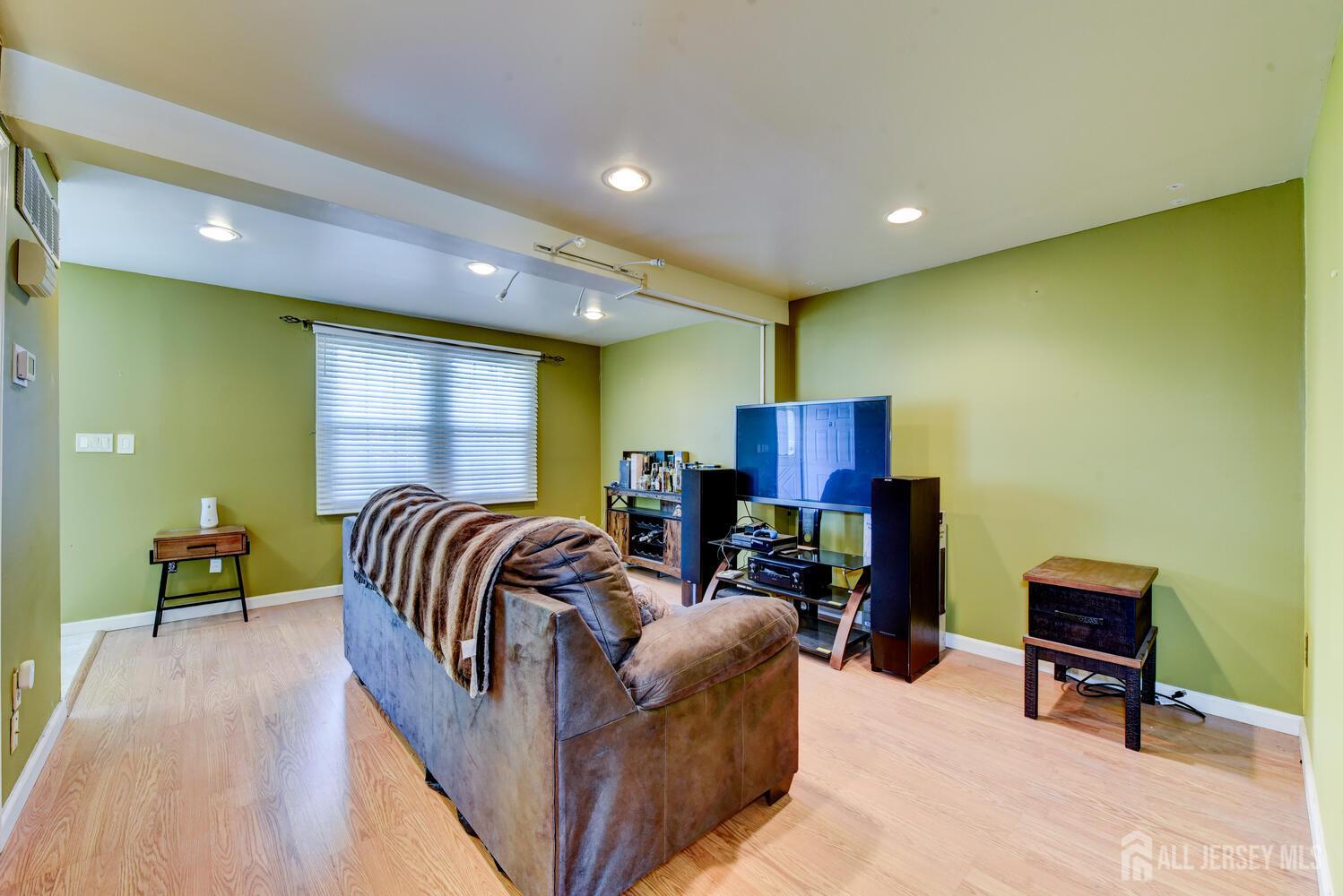 675 Bound Brook Road, Unit C0016 Dunellen, NJ 08812 - Photo 10 of 39 a living room with furniture