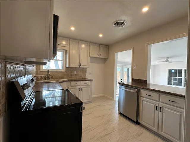 a kitchen with lots of counter top space
