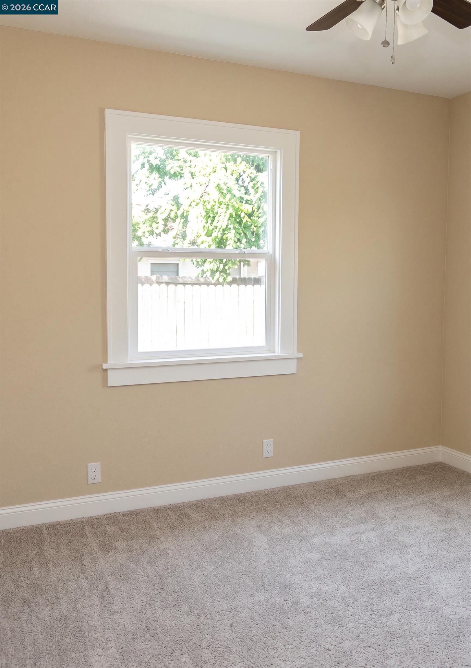 70 West Rose Bay Point, CA 94565 - Photo 6 of 8 an empty room with a window