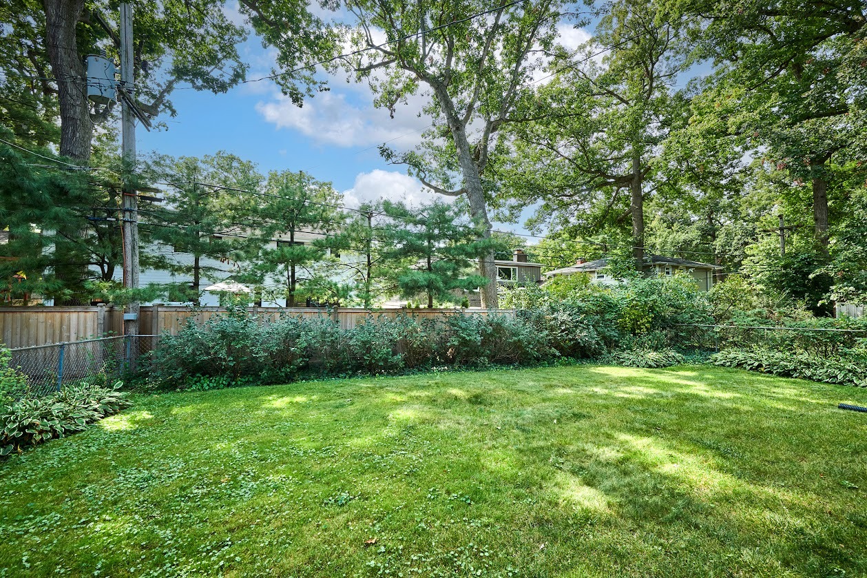1859 Prairie Avenue Park Ridge, IL 60068 - Photo 26 of 27 a view of a garden with a lake