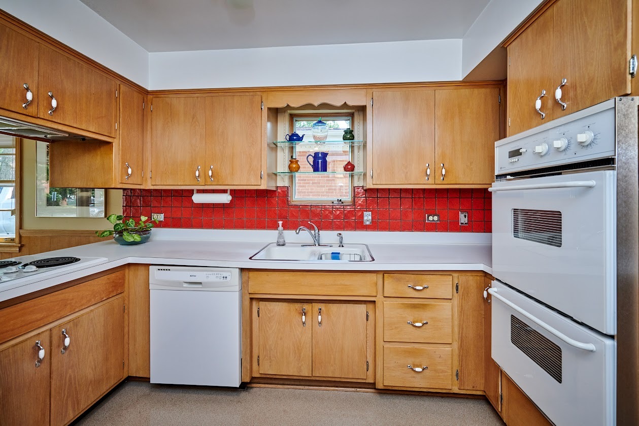 1859 Prairie Avenue Park Ridge, IL 60068 - Photo 4 of 27 a kitchen with a sink and cabinets