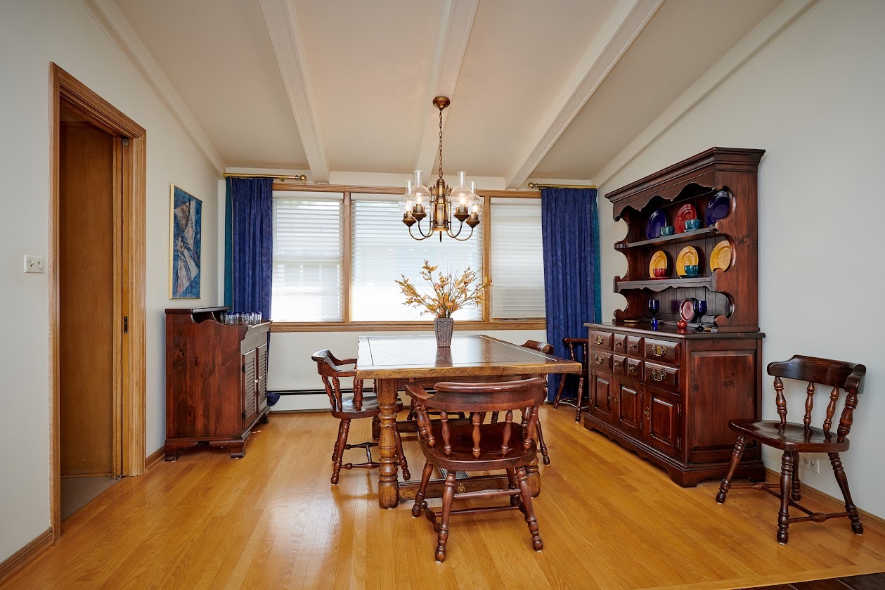 1859 Prairie Avenue Park Ridge, IL 60068 - Photo 7 of 27 a dining room with furniture window and wooden floor