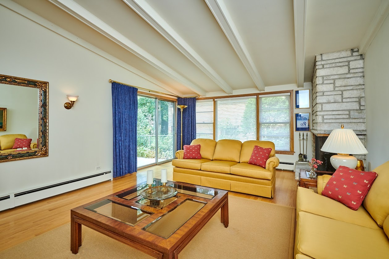 1859 Prairie Avenue Park Ridge, IL 60068 - Photo 8 of 27 a living room with furniture and a floor to ceiling window