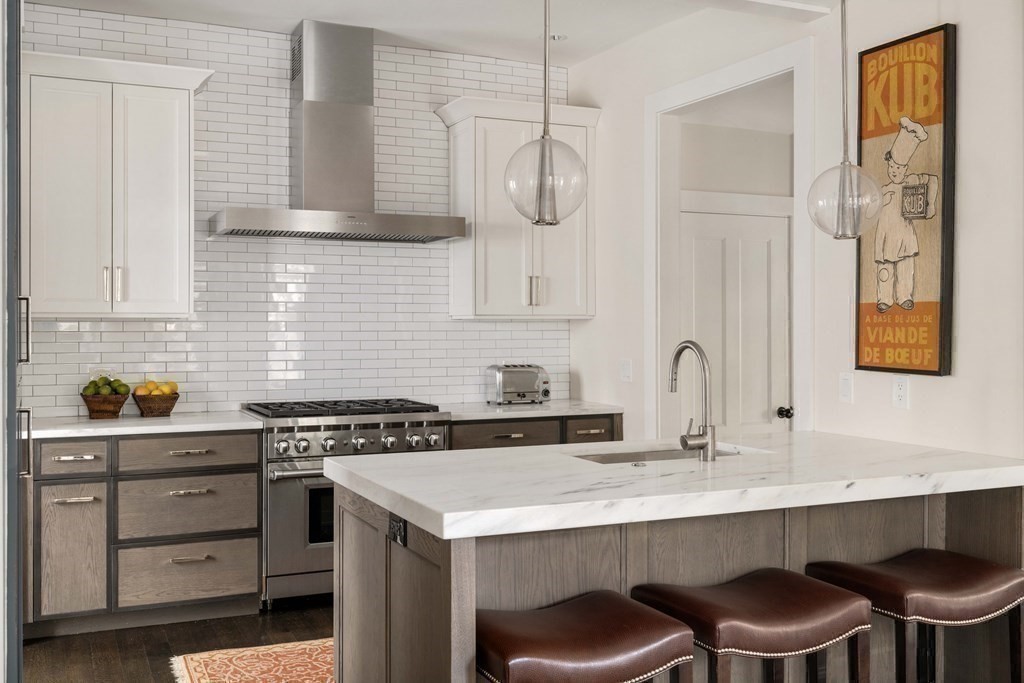 39 Meacham Road, Unit 39 Somerville, MA 02144 - Photo 11 of 40 a kitchen with a sink cabinets and appliances